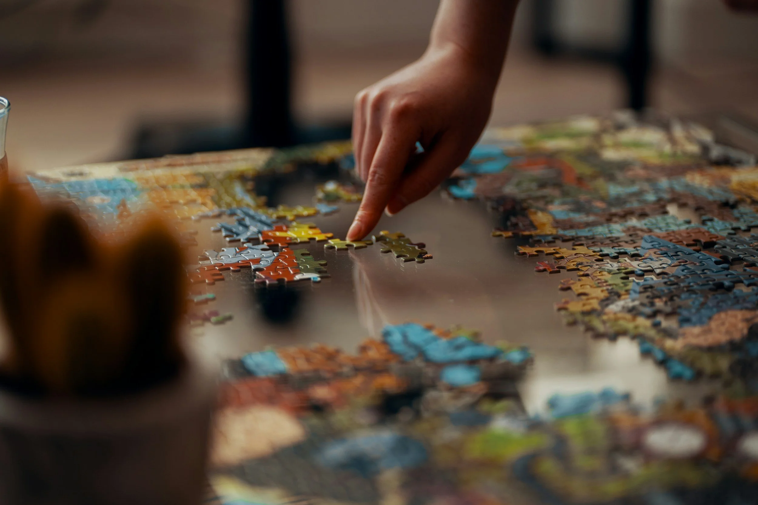 Team collaborating on a puzzle activation