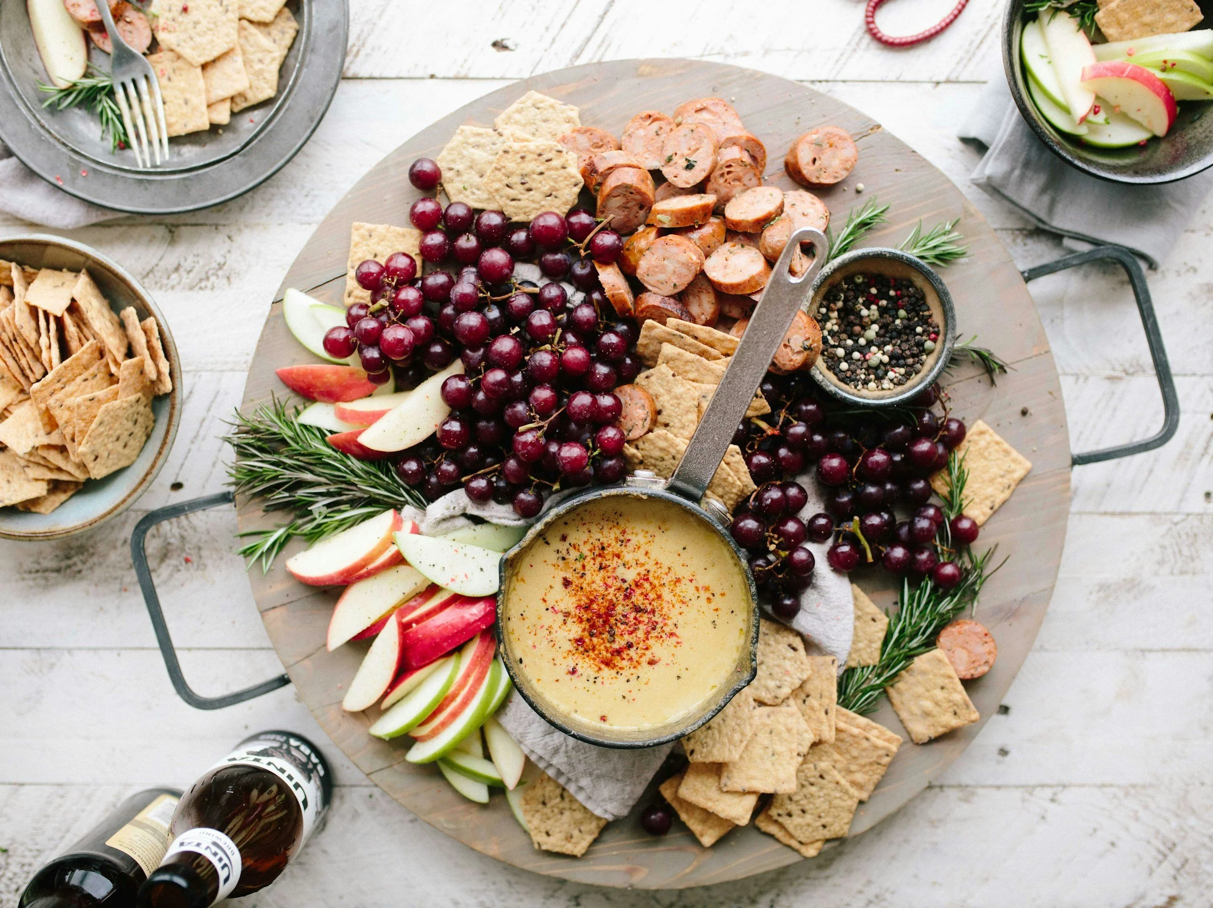 Shareable charcuterie and cheese platter with fruit and crackers