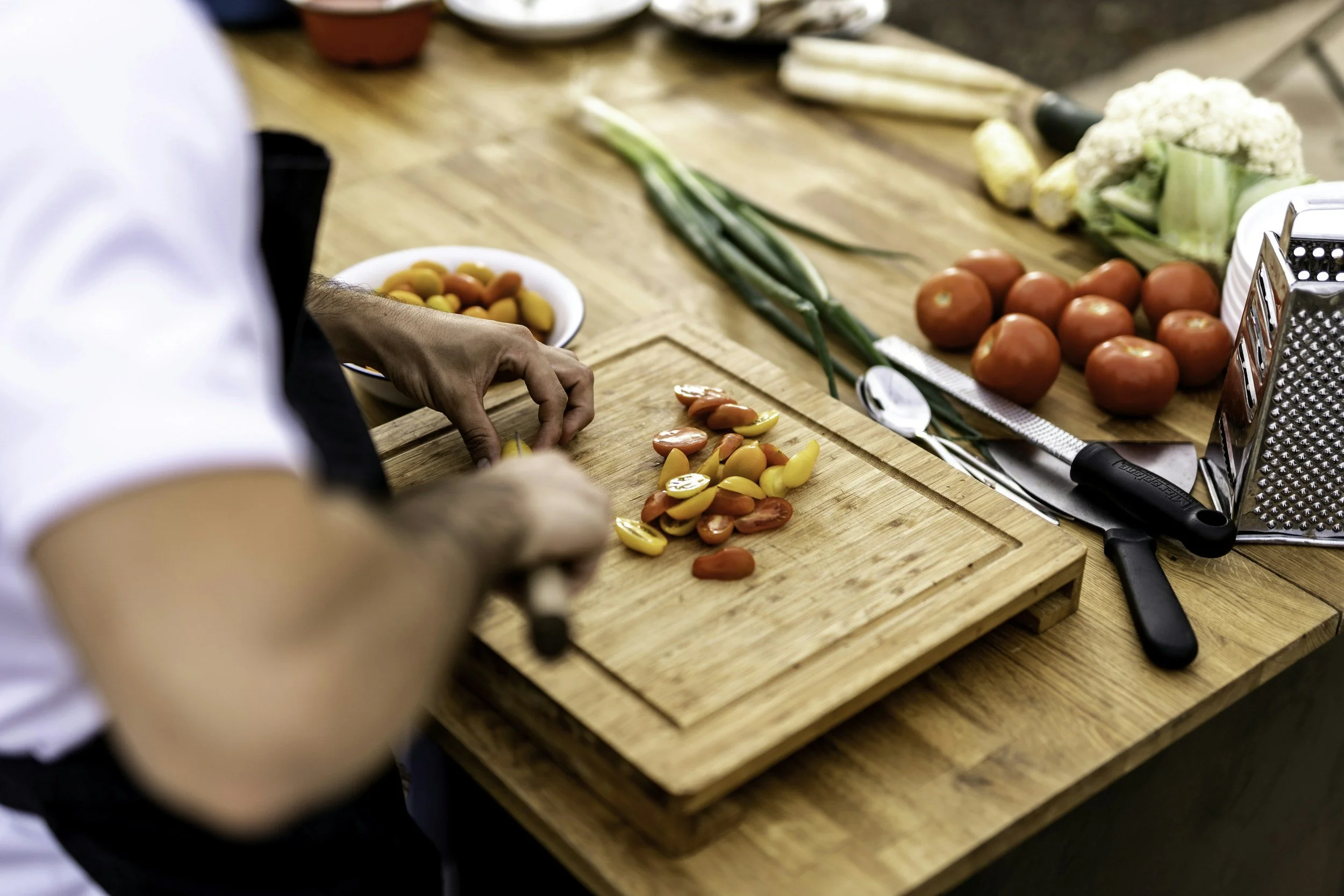 Fresh vegetables being prepped for a wellness cooking demo