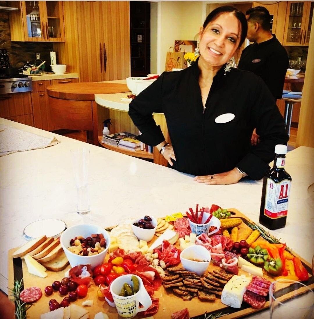 Chef Teena presenting a private chef charcuterie spread