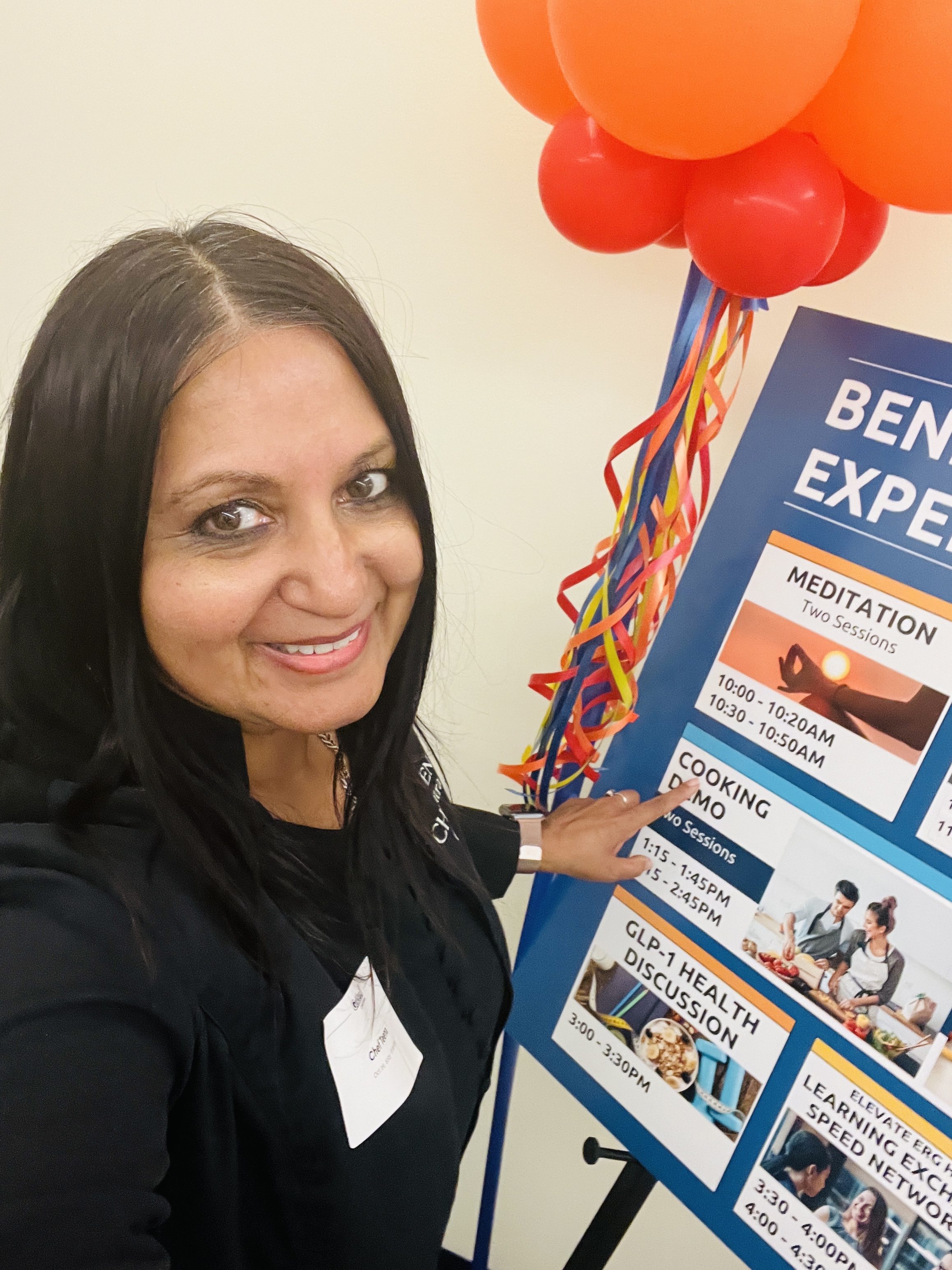 Chef Teena presenting a cooking demo at a corporate wellness event