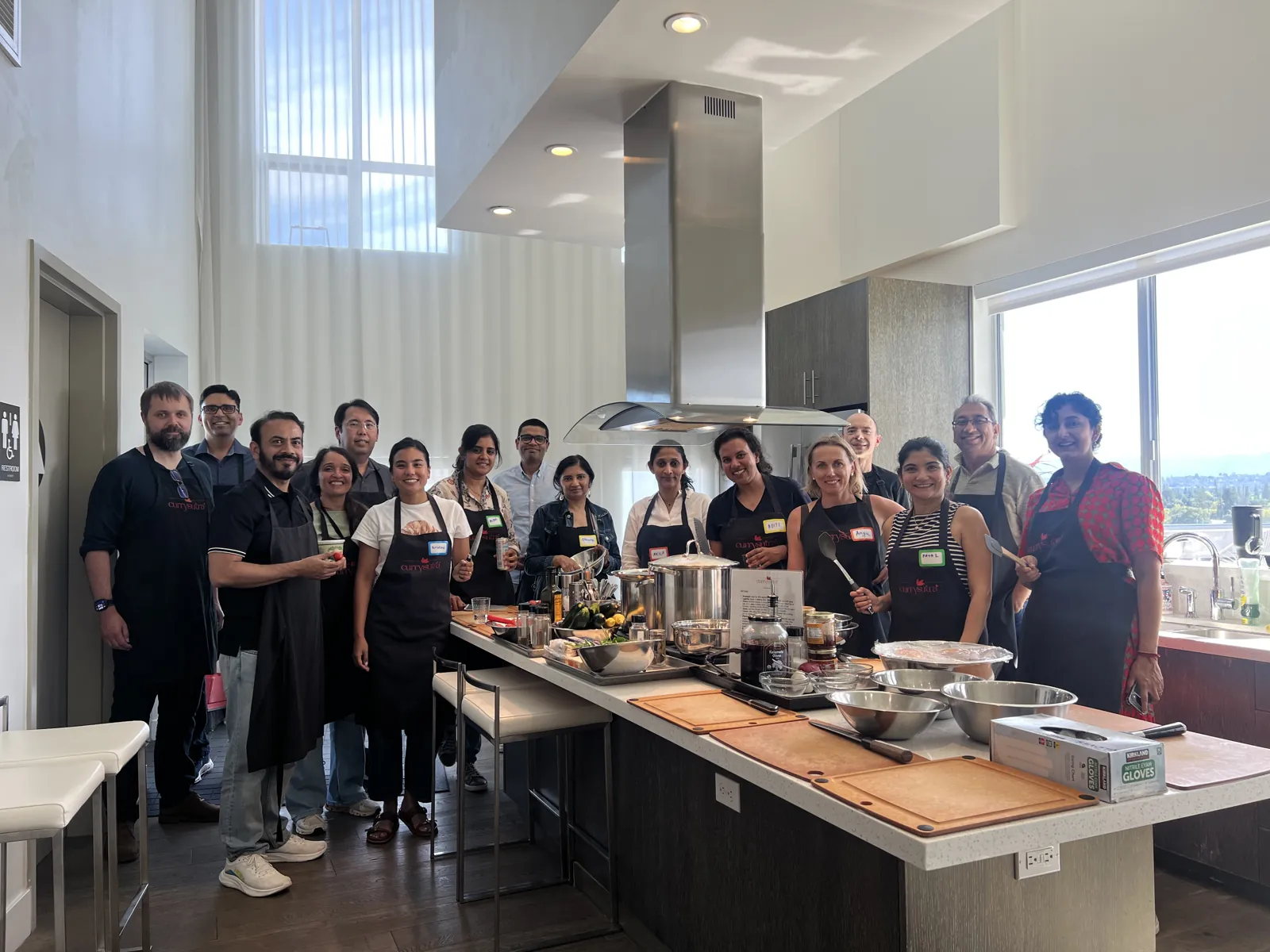 Currysutra team group photo at the Eats Meets West Bowls kitchen